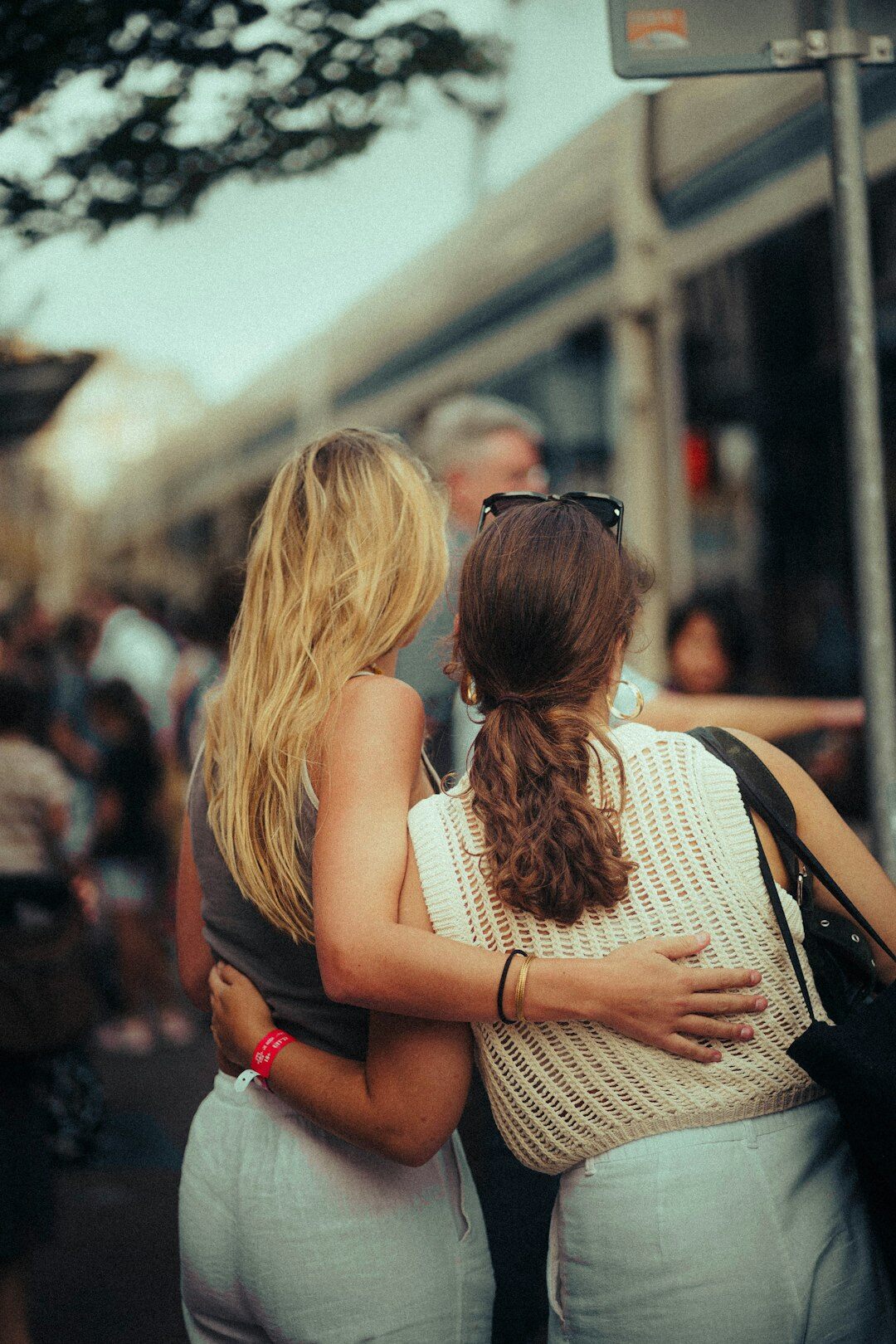 celebrity friends hugging after scandal