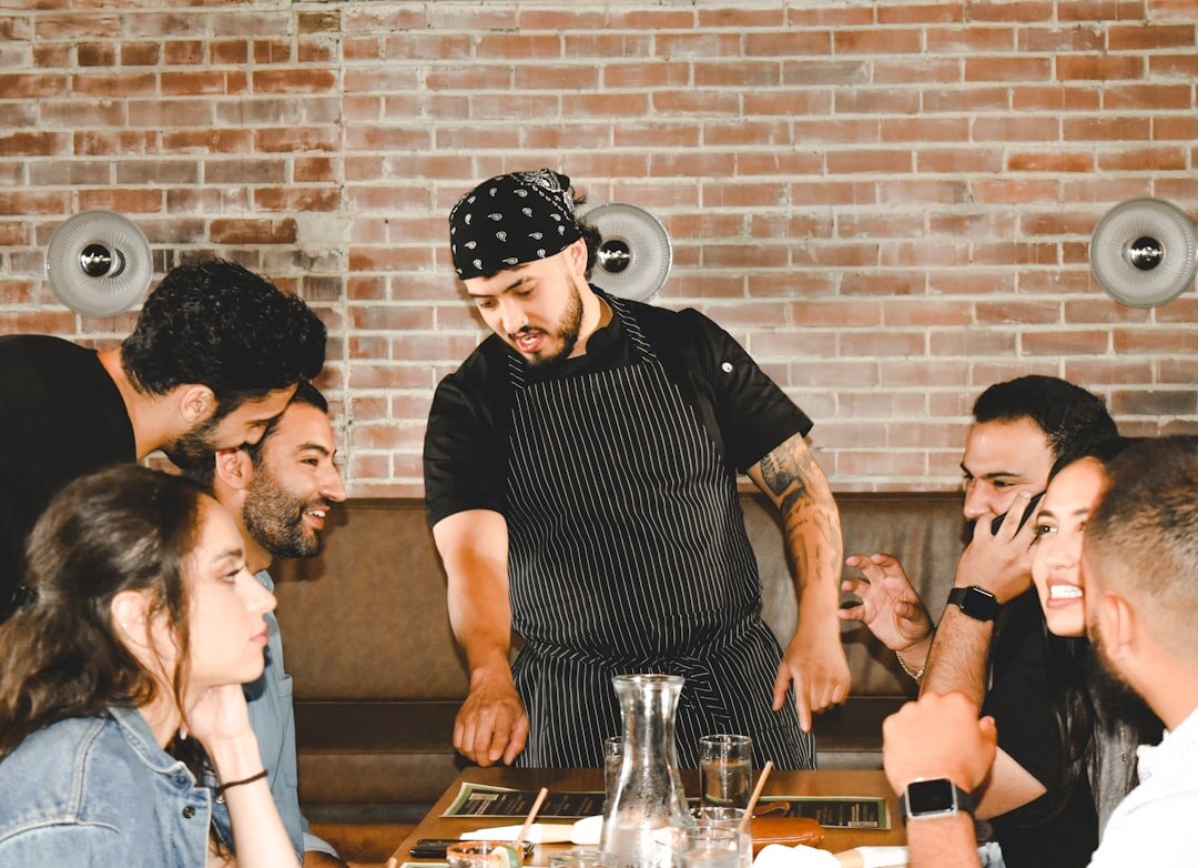 group of friends at dinner table