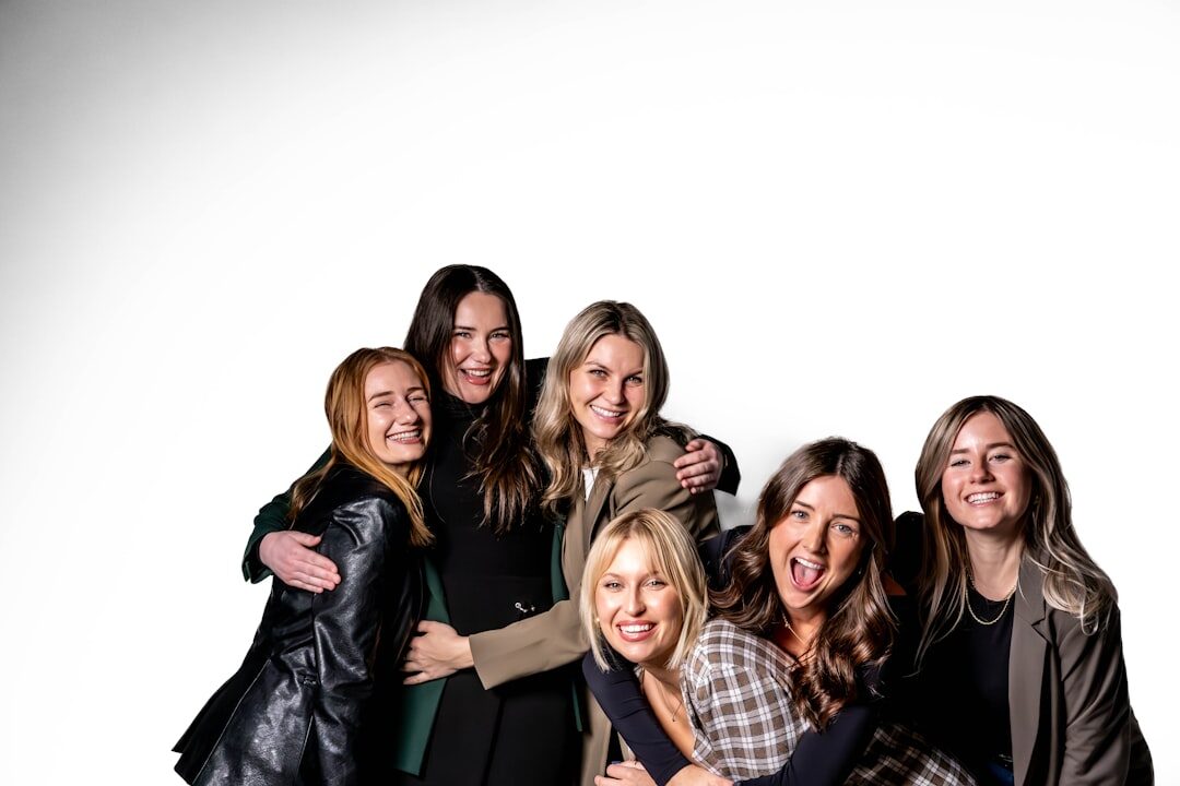 group of celebrities smiling