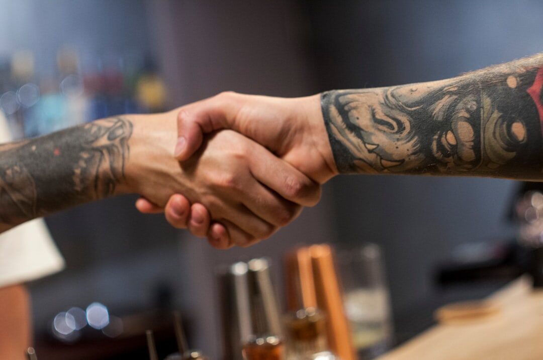 celebrity handshake after scandal